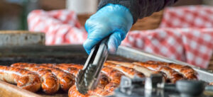 Sausages,Cooking,On,Grill.,Street,Food,Market,Vendor